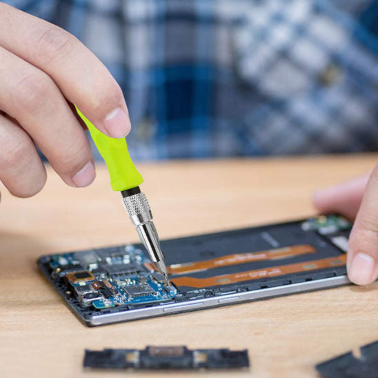 Tournevis-vert-fluo-smartphone-reparation-vis