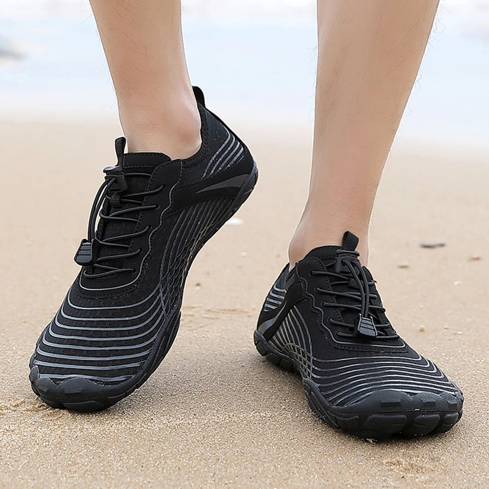 chaussures-pieds-nu-sport-noir-plage